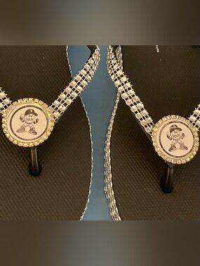 Crystal-Embellished Black Flip Flops with Logo Medallions